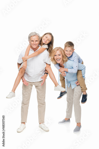 kids piggybacking on grandparents