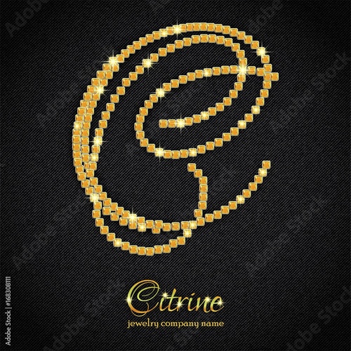 Calligraphic letter C from realistic crystals with sparkles of precious stone Citrine on black denim background. Fashion jewelry backdrop. Vector illustration