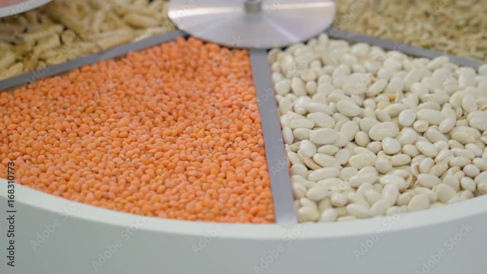 13899_Different_kinds_of_beans_inside_the_turning_machine.mov 13899_Different_kinds_of_beans_inside_the_turning_machine.mov