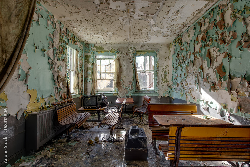 Naklejka premium Wooden Cafeteria Seats - Abandoned Hospital