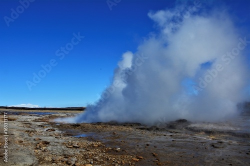 Strokkur Geysir, geothermal area in Iceland - part of the Golden Circle