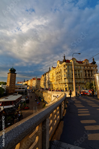 Czech Republic, Prague view from the bridge on Vltava river and buildings.