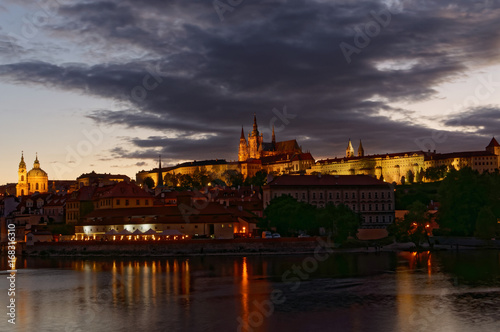 Czech Republic  Prague  Night view on Hradcany castle.Beautifully lit castle and Vltava river in the foreground.