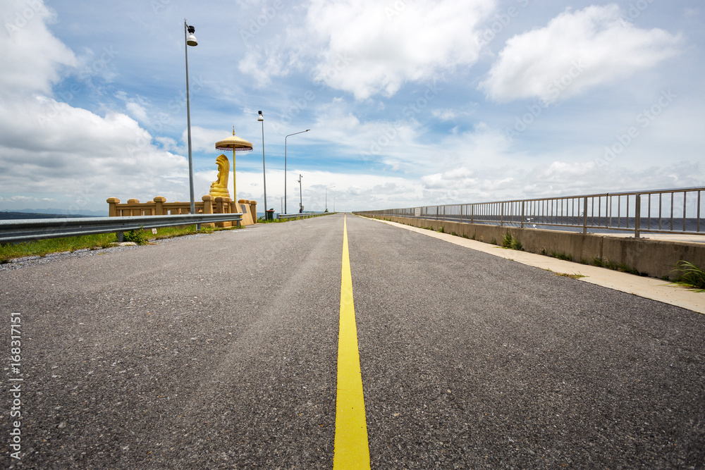 Fototapeta premium Buddha statue located on lamtakong dam nakhonratchasima thailand