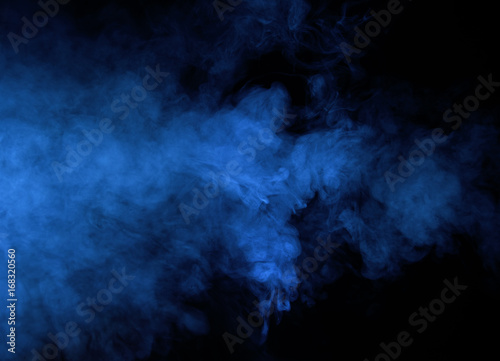 Abstract blue smoke on a dark background