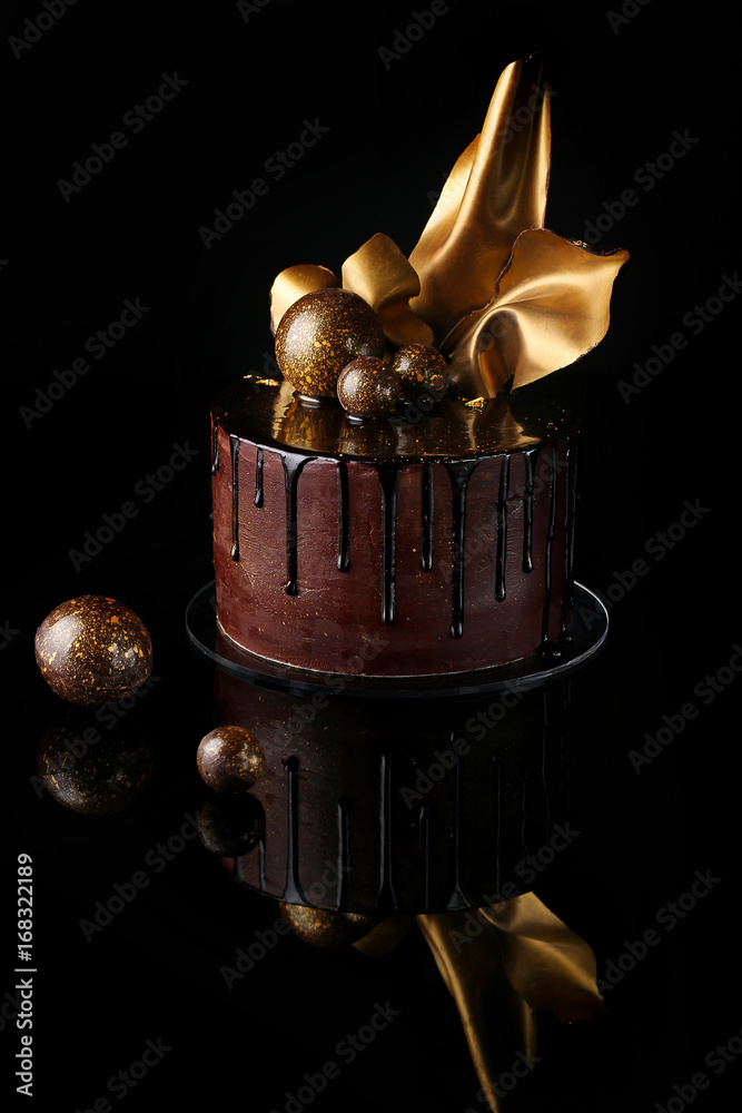 Fancy chocolate cake, isolated, black background Stock Photo | Adobe Stock