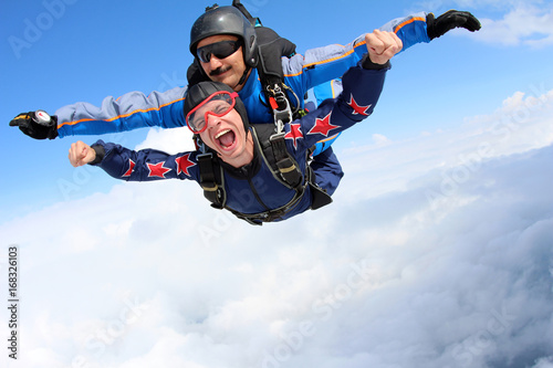Obraz na płótnie Skydiving. Tandem jump. Happy Passenger.