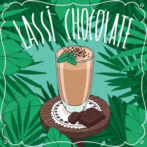 Cocoa or cacao Lassi, national Indian drink, on wooden table with piece of chocolate bar. Natural background. Realistic hand draw style. Lettering Lassi Chocolate