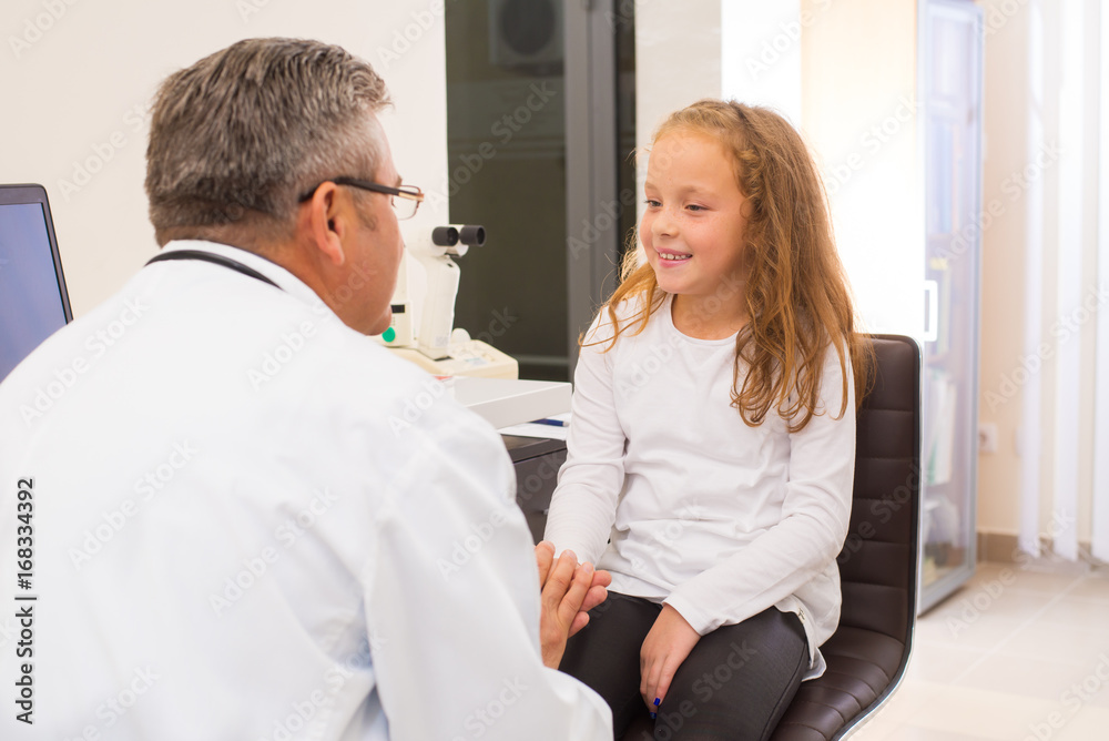 Fototapeta premium Doctor and young patient in office