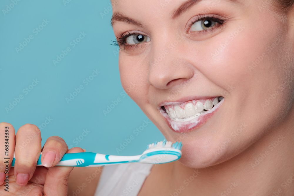 woman with toothbrush brushing cleaning teeth woman with toothbrush brushing cleaning teeth