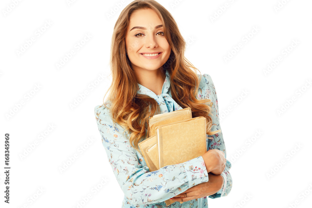 Portrait of a beautiful young student in glasses with books over white background Portrait of a beautiful young student in glasses with books over white background