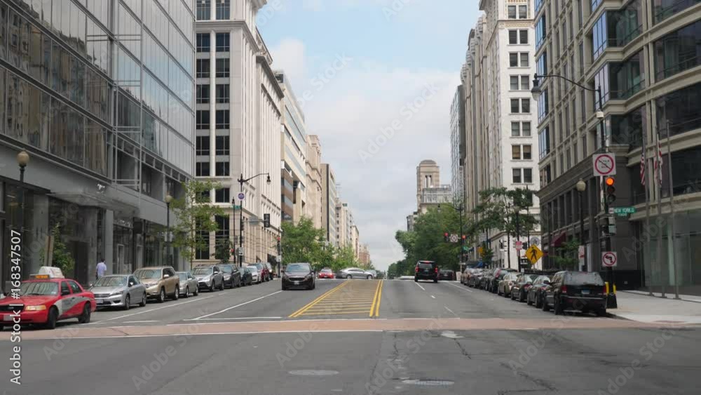WASHINGTON, D.C. - Circa August, 2017 - A daytime exterior establishing shot of an intersection in downtown DC. WASHINGTON, D.C. - Circa August, 2017 - A daytime exterior establishing shot of an intersection in downtown DC.