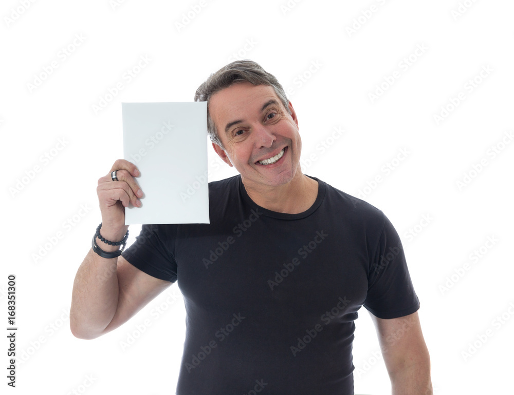 Middle-aged man wears black t-shirt. He holds the sign next to his face.. Middle-aged man wears black t-shirt. He holds the sign next to his face..