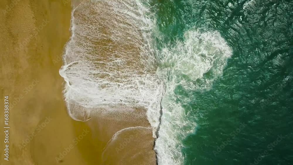 Top view of a deserted beach. The Portuguese coast of the Atlantic Ocean Top view of a deserted beach. The Portuguese coast of the Atlantic Ocean