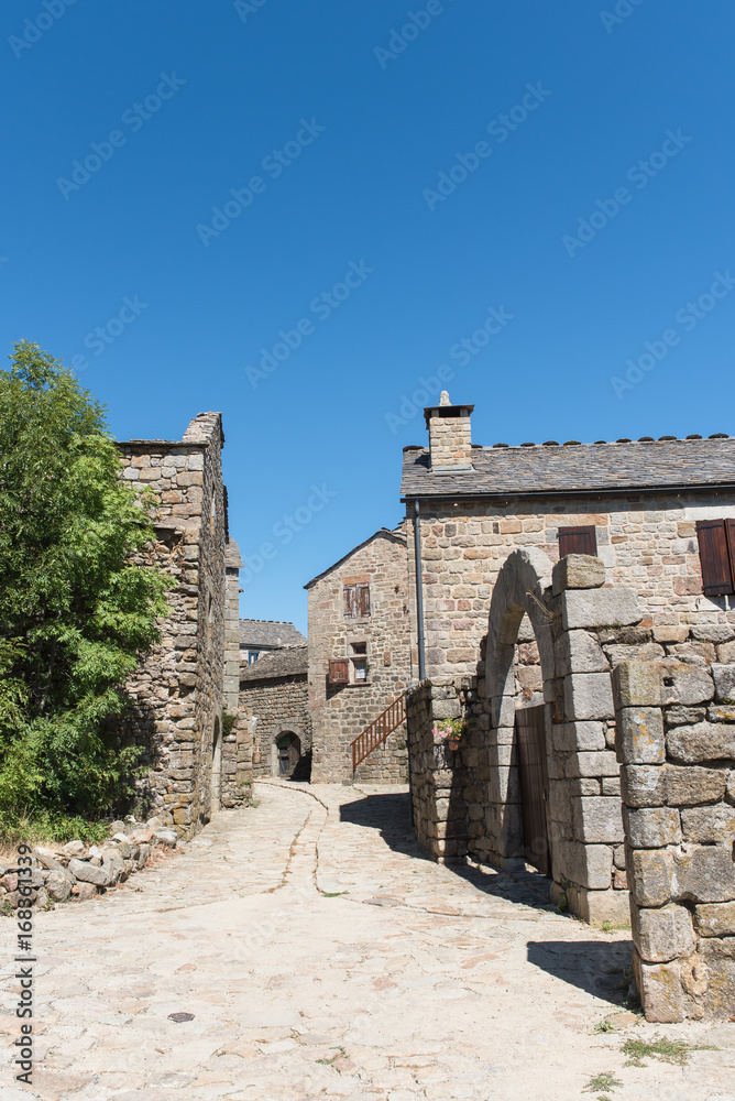 La Garde-Guerin, fortified village in Lozere, old houses, in the Cevennes in France
