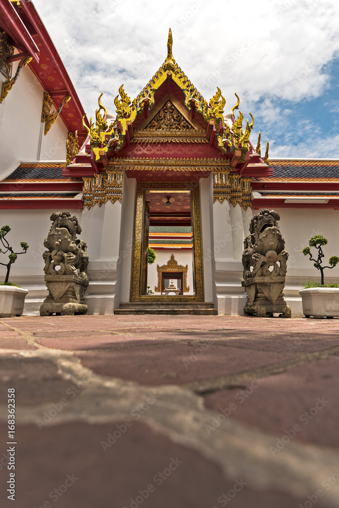Doorway at Wat Pho Buddhist temple. Doorway at Wat Pho Buddhist temple.
