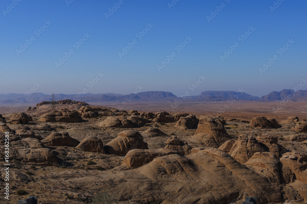 Red rocks and sand desert in Jordan