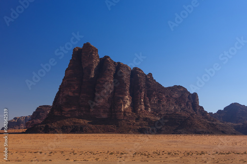 Red rocks and sand desert in Jordan