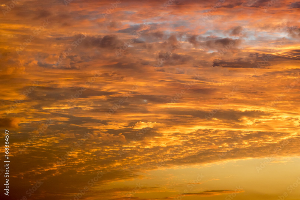 Fototapeta premium Beautiful clouds at sunset, improbable sky