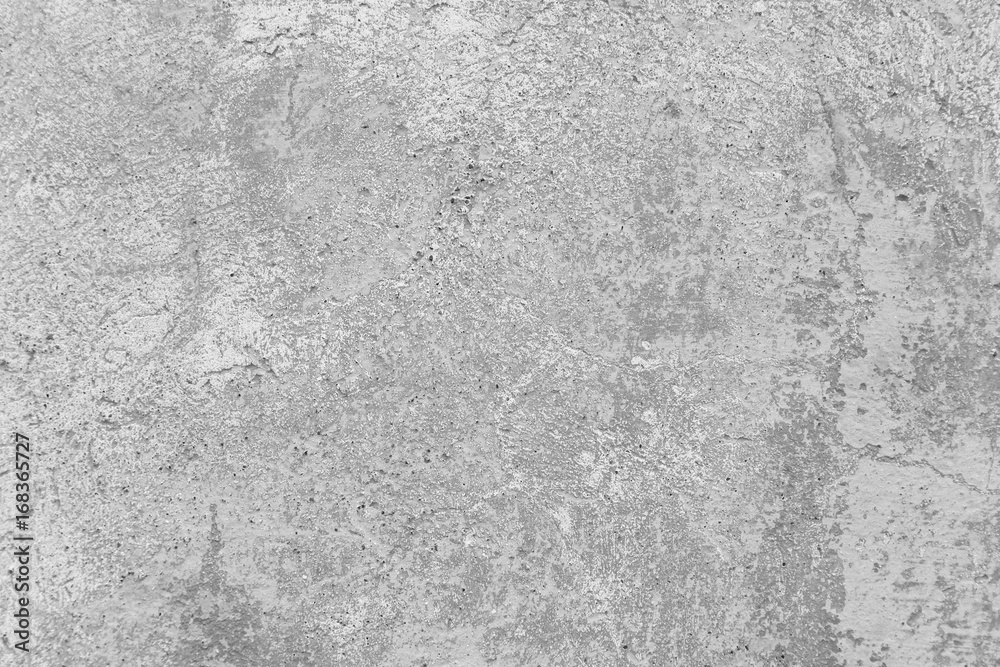 Fototapeta premium Close-up of a weathered and aged concrete wall. Texture background in black and white.