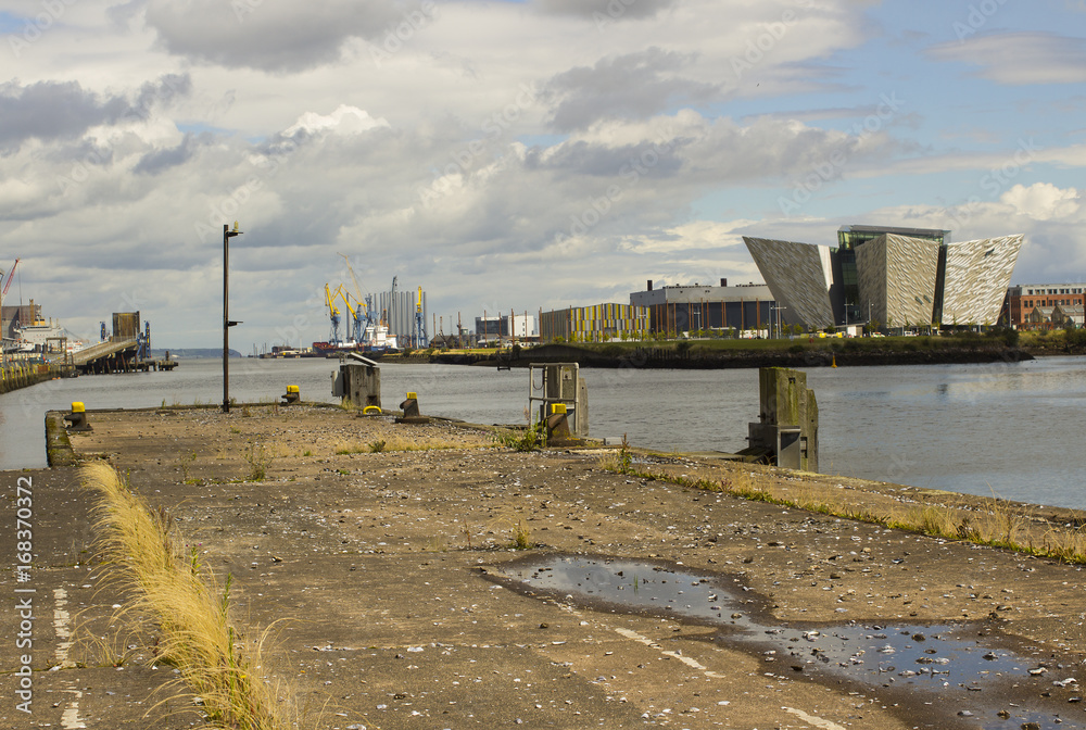 The River Lagan in Belfast including the iconic Titanic Centre from one of the disused ferry terminal loading ramps on Donegall Quay The River Lagan in Belfast including the iconic Titanic Centre from one of the disused ferry terminal loading ramps on Donegall Quay
