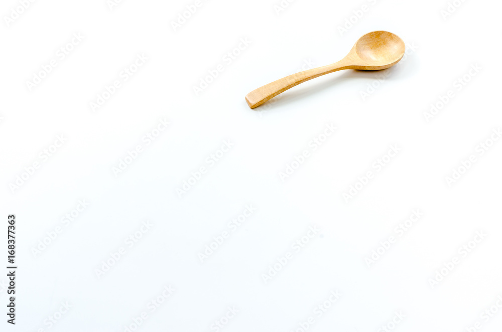 Wooden spoon on the white background Wooden spoon on the white background