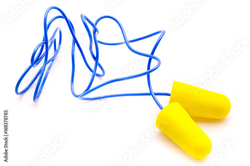 Yellow earplugs with blue band.
