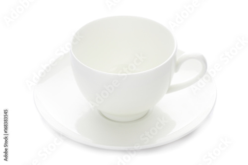 Empty white cup and saucer isolated on white