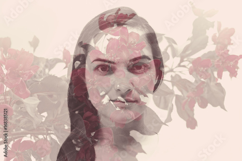 Fototapeta Naklejka Na Ścianę i Meble -  double exposure: portrait of a young girl and blossoming branch of Apple tree