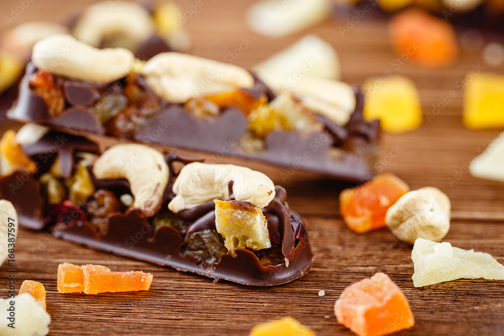 Chocolate bars with cashew and candied fruits