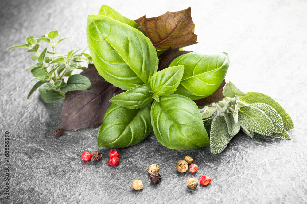 Herbs and spices over black stone background. Top view. - obrazy, fototapety, plakaty 