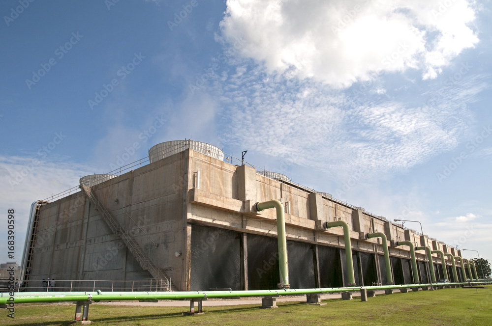Wide angel of Power plat cooling, Cooling tower, wet, atmospheric with blue sky Wide angel of Power plat cooling, Cooling tower, wet, atmospheric with blue sky