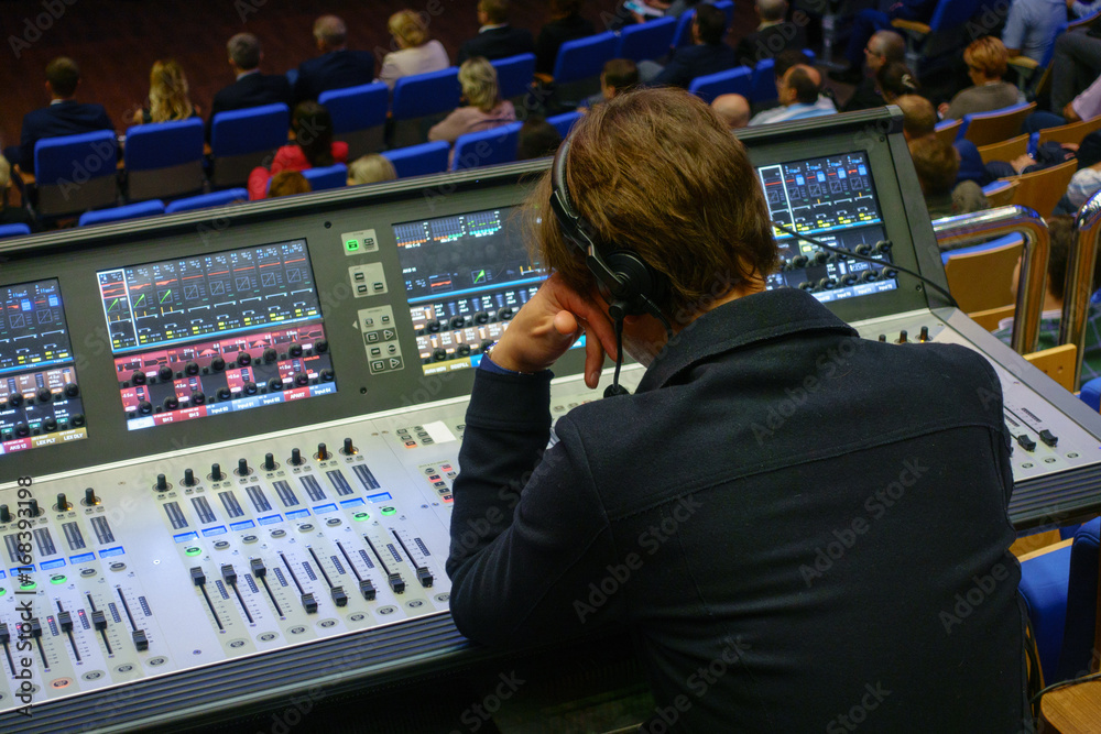 Video and audio engineer working at the event Video and audio engineer working at the event