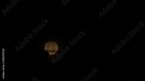 Penumbra moon with the construction foreground. 