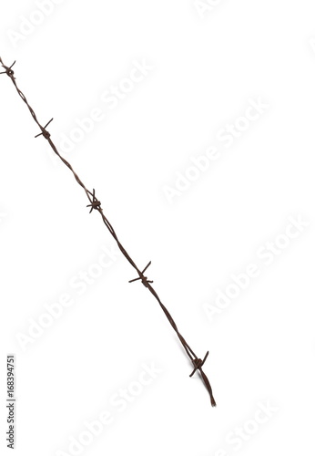 Old security barbed wire fence isolated on white background