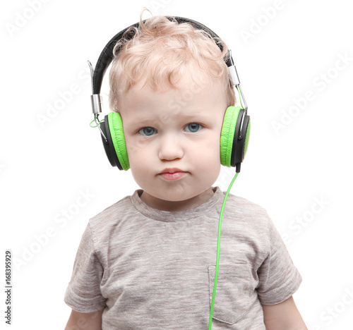 Cute little boy with headph...