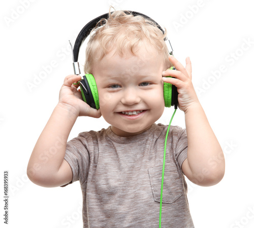 Cute little boy with headph...