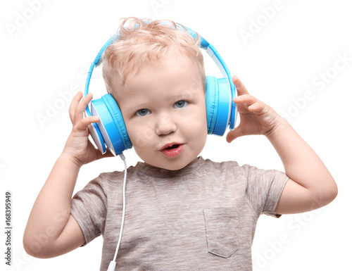 Cute little boy with headph...