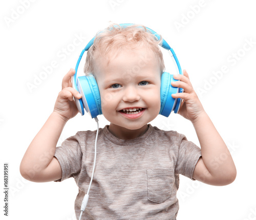 Cute little boy with headph...