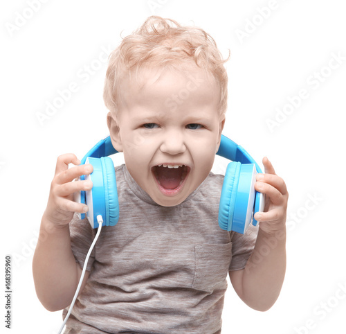 Cute little boy with headph...