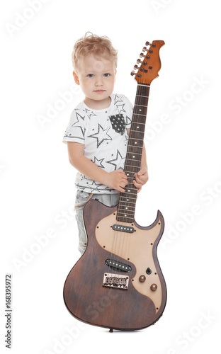 Cute little boy with electr...