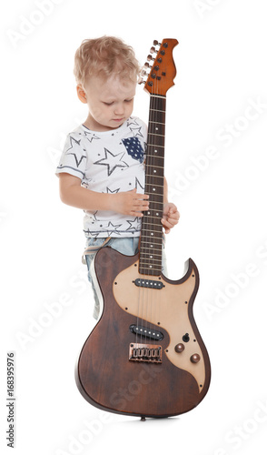 Cute little boy with electr...