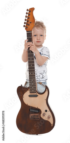 Cute little boy with electr...
