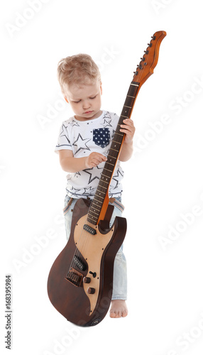 Cute little boy with electr...
