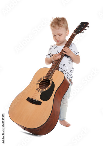 Cute little boy with acoust...