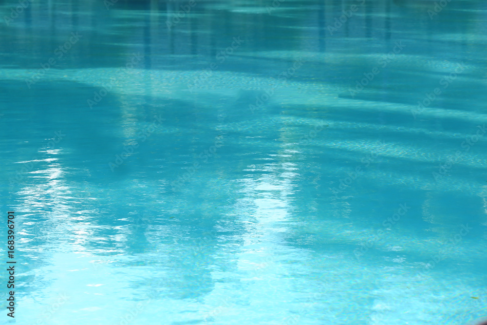 Clear blue water in swimming pool at resort