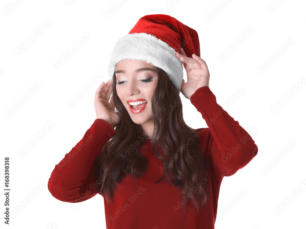 Pretty emotional lady in Christmas hat on white background