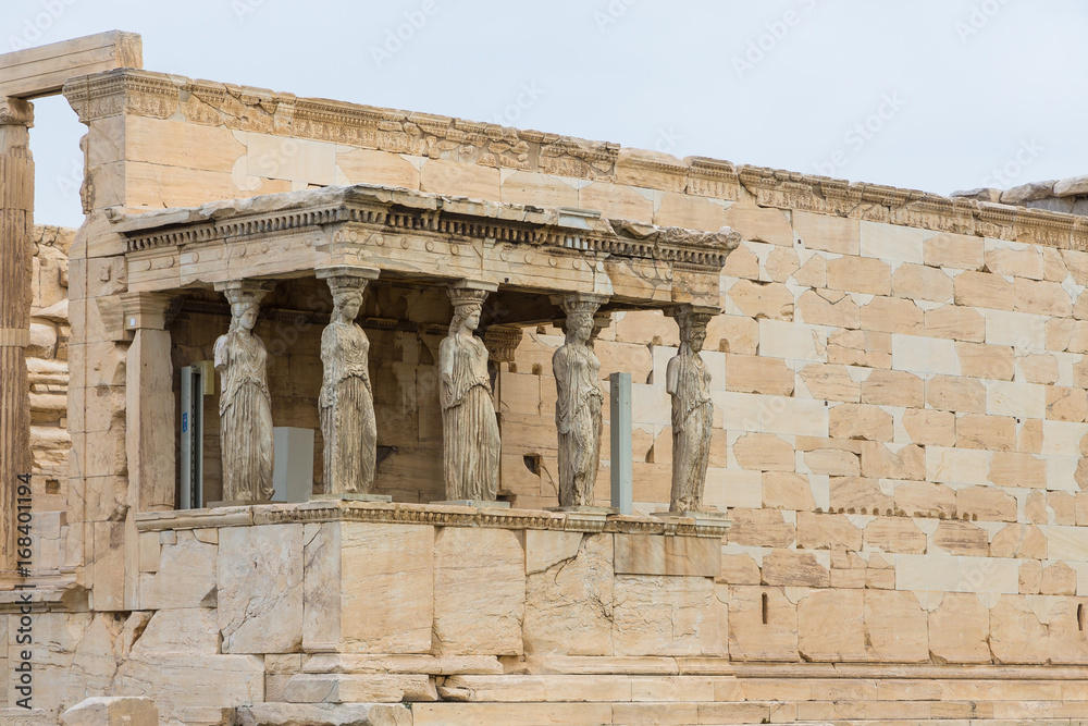Erechtheion is an ancient Greek temple, on the north side of the Acropolis of Athens in Greece. Erechtheion is an ancient Greek temple, on the north side of the Acropolis of Athens in Greece.