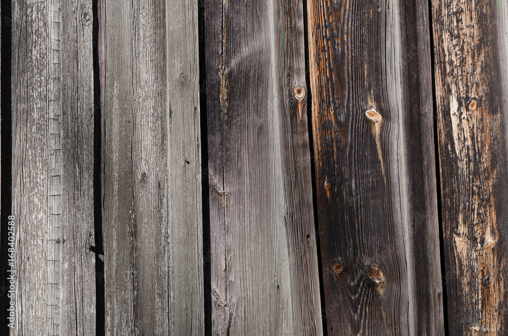 Fototapeta premium dark wooden boards with brown and gray spots