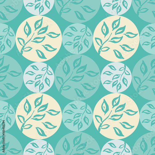 Polka dot seamless pattern. Branch with leaves in a circle. Textile rapport.